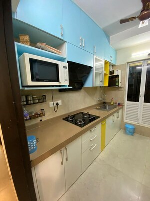 Kitchen in 2 BHK Apartment at Dosti West County, Balkum Pada – for Rent
