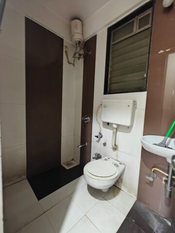 Bathroom in 2 BHK Apartment at Neelsidhi Atlantis, Nerul – for Rent