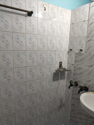 Bathroom in 1 RK Apartment at RWA Apartments Sector 26, Sector 26 – for Rent