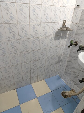 Bathroom in 1 RK Apartment at RWA Apartments Sector 26, Sector 26 – for Rent