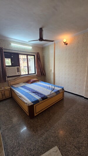 Bedroom in 2 BHK Apartment at Dheeraj Ganga, Malad West – for Rent