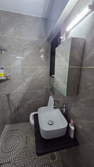 Bathroom in 2 BHK Apartment at Dheeraj Ganga, Malad West – for Rent