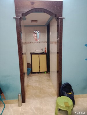 Building Lobby in 1.5 BHK Apartment at Anand House, Sector 19 Belapur – for Sale