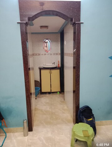 Building Lobby in 1.5 BHK Apartment at Anand House, Sector 19 Belapur – for Sale