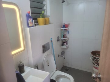 Bathroom in 1 BHK Apartment at Cosmos 27 Gbr, Kasarvadavali – for Rent