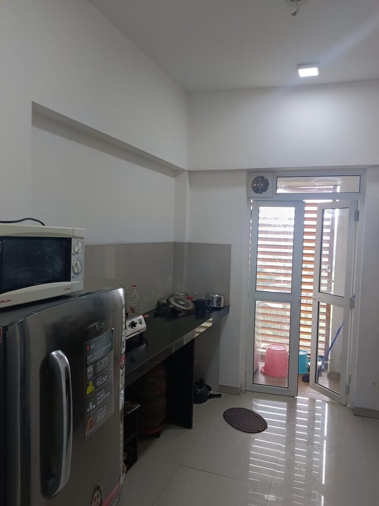 Kitchen, lodha-belmondo 2 Bedroom 1341 Sq.Ft. Apartment In Gahunje Pune 9555113