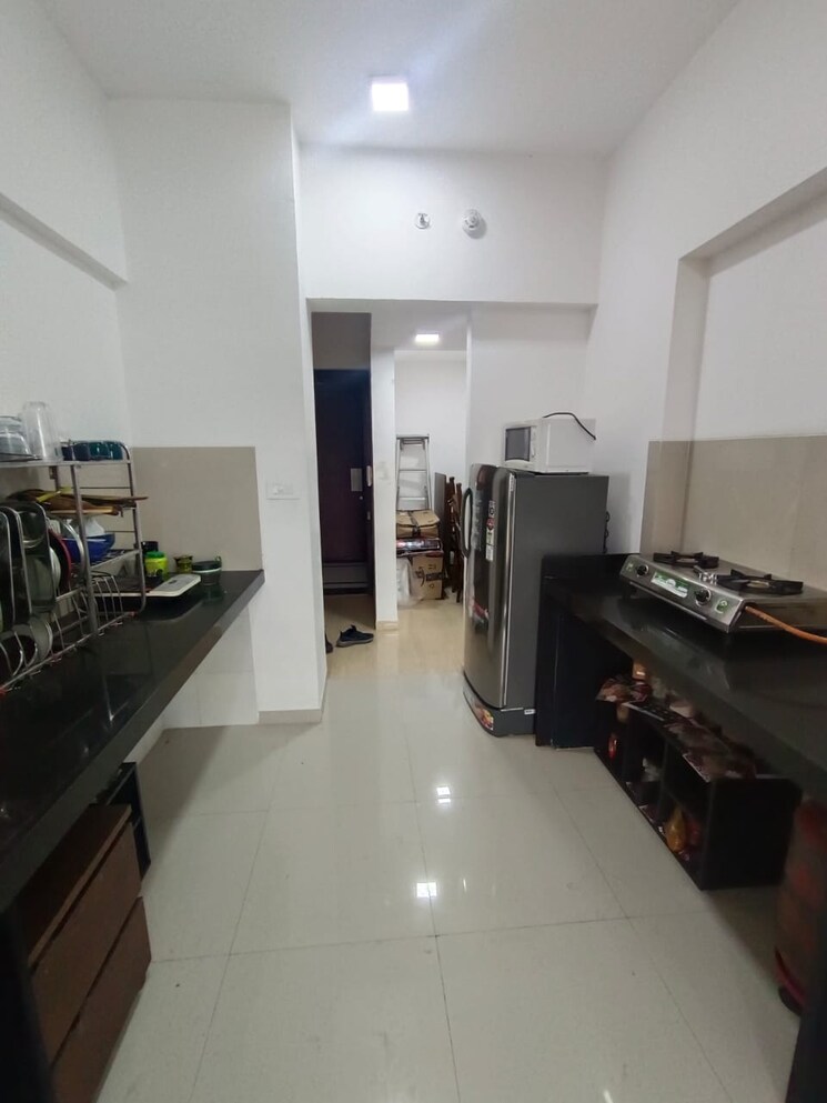 Kitchen, lodha-belmondo 2 Bedroom 1341 Sq.Ft. Apartment In Gahunje Pune 9555113