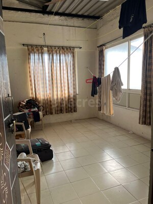 Living Room in 2 BHK Apartment at Parmar Square, Kharadi – for Rent