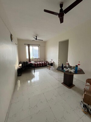 Living Room in 2 BHK Apartment at Parmar Square, Kharadi – for Rent