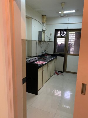 Kitchen in 1 BHK Apartment at K Raheja Raheja Residency, Malad East – for Rent