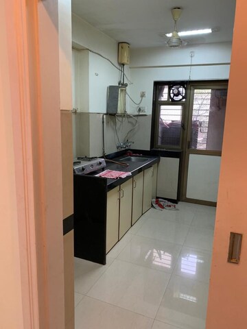Kitchen in 1 BHK Apartment at K Raheja Raheja Residency, Malad East – for Rent