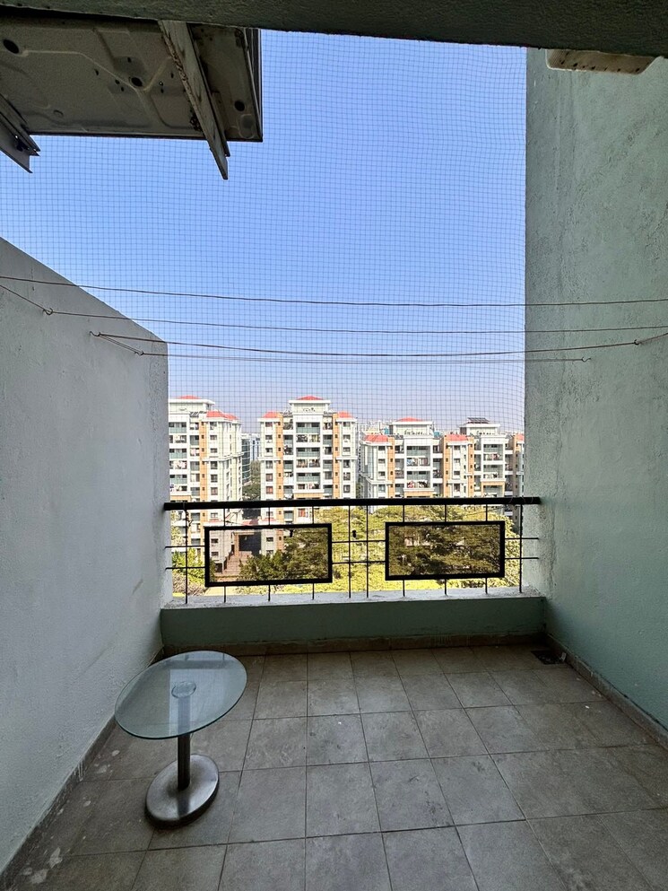 Balcony, magarpatta-city-iris 2 Bedroom 1000 Sq.Ft. Apartment In Hadapsar Pune 9555210
