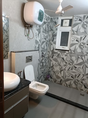 Bathroom in 2 BHK Builder Floor at Ansal API Esencia, Sector 67 – for Rent