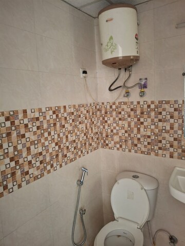 Bathroom in 2.5 BHK Apartment at Amrapali Terrace Homes, Tech Zone 4 Greater Noida – for Rent