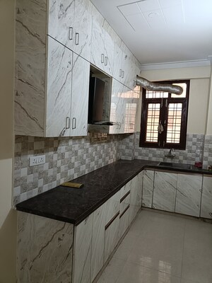 Kitchen in 3 BHK Builder Floor at Ansal API Esencia, Sector 67 – for Rent