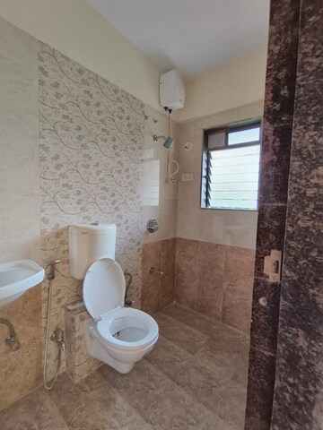 Bathroom in 2 BHK Apartment at Aggarwal Sumeet Elegance, Manpada – for Rent