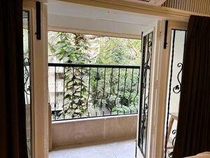 Balcony in 4 BHK Apartment at Premal Apartment, Santacruz West – for Rent