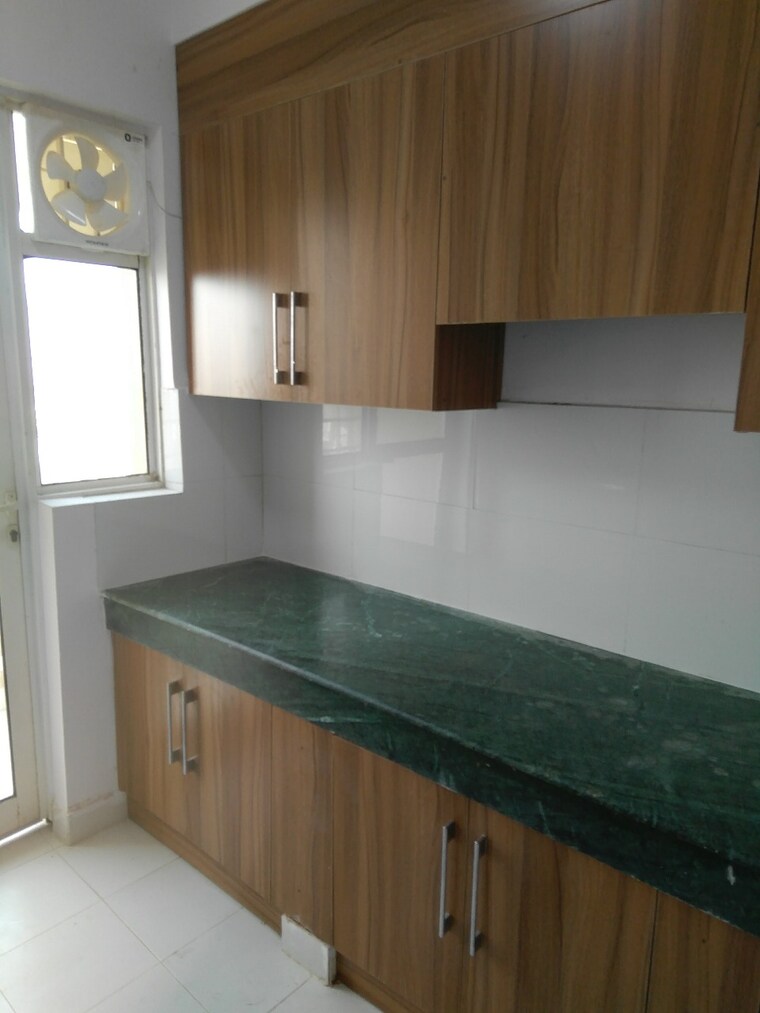 Kitchen, paras-tierea 2.5 Bedroom 1195 Sq.Ft. Apartment In Sector 137 Noida 9555600