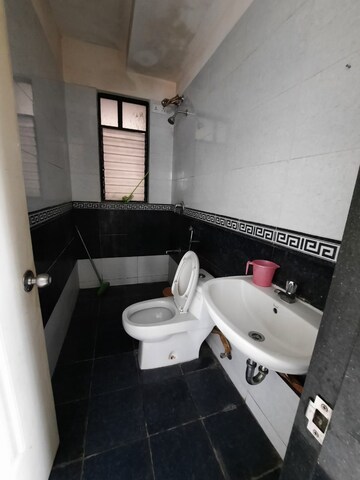 Bathroom in 2.5 BHK Apartment at Nanded City Sur, Nanded – for Rent