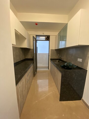 Kitchen in 2 BHK Apartment at Rustomjee Summit, Borivali East – for Rent