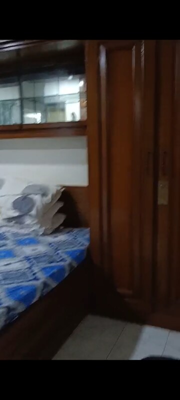 Bedroom in 2 BHK Apartment at Amit Tata Employees CHS, Prabhadevi – for Rent