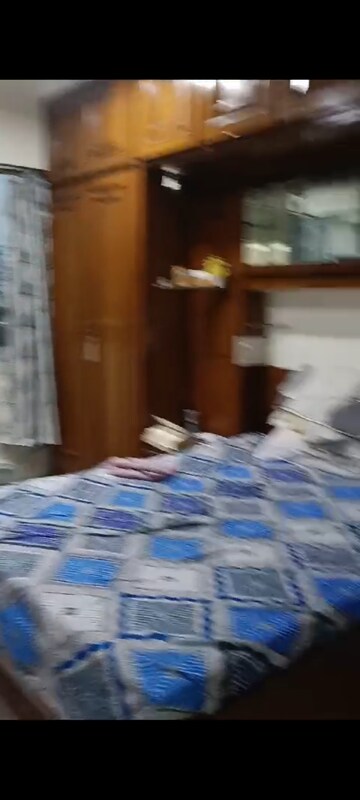 Bedroom in 2 BHK Apartment at Amit Tata Employees CHS, Prabhadevi – for Rent