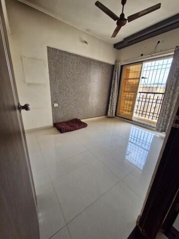 Bedroom in 2 BHK Apartment at Agarwal Paramount, Virar West – for Rent