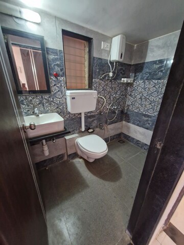Bathroom in 2 BHK Apartment at Agarwal Paramount, Virar West – for Rent