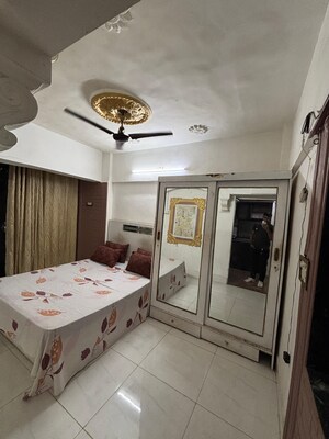 Bedroom in 2 BHK Apartment at Golds Green Apartment, Andheri West – for Rent