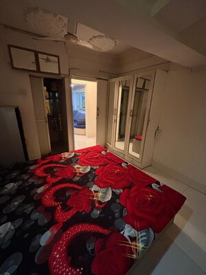 Bedroom in 2 BHK Apartment at Golds Green Apartment, Andheri West – for Rent