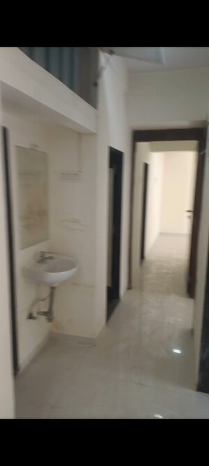 Bathroom in 2 BHK Apartment at RNA NG Canary, Mira Road – for Sale