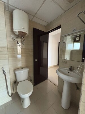 Bathroom in 2.5 BHK Apartment at Supertech Ecociti, Sector 137 – for Sale