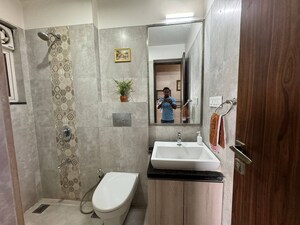 Bathroom in 2 BHK Apartment at Omkar Ananta, Goregaon East – for Rent