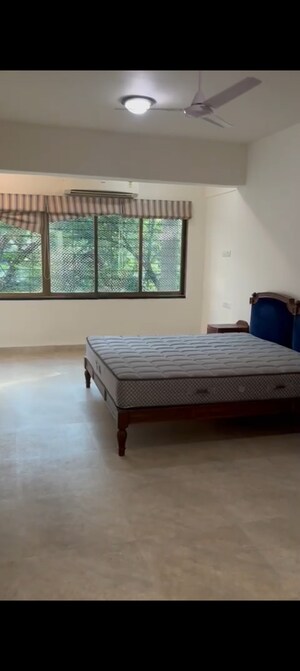 Bedroom in 2 BHK Apartment at Nibbana Apartments, Bandra West – for Rent
