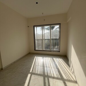 Room in 2 BHK Apartment at Samarpan Anuraj CHS, Borivali East – for Sale
