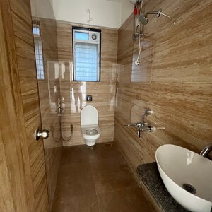 Bathroom in 2 BHK Apartment at Samarpan Anuraj CHS, Borivali East – for Sale