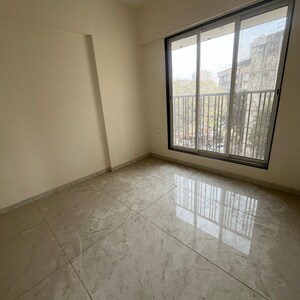 Room in 2 BHK Apartment at Samarpan Anuraj CHS, Borivali East – for Sale