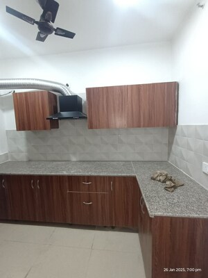 Kitchen in 3 BHK Apartment at RG Luxury Homes, Sector 16b Greater Noida – for Rent
