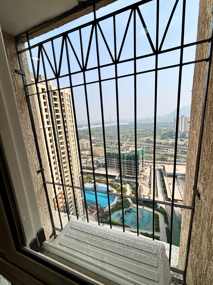 Balcony, dosti-west-county-phase-4-dosti-pine 2 Bedroom 695 Sq.Ft. Apartment In Balkum Pada Thane 9556154