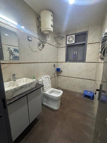 Bathroom in 2 BHK Builder Floor at Chattarpur – for Rent