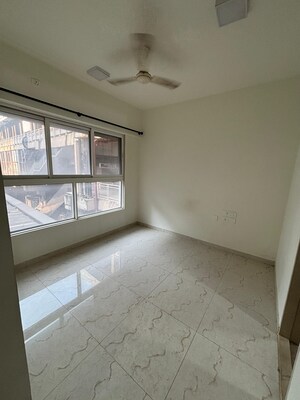 Room in 1 BHK Apartment at Parijat CHS Azad Nagar, Andheri West – for Rent