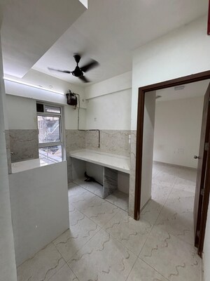 Kitchen in 1 BHK Apartment at Parijat CHS Azad Nagar, Andheri West – for Rent