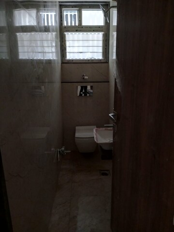 Bathroom in 3 BHK Apartment at Bafna Arisha, Lulla Nagar – for Sale