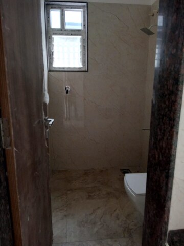 Bathroom in 3 BHK Apartment at Bafna Arisha, Lulla Nagar – for Sale