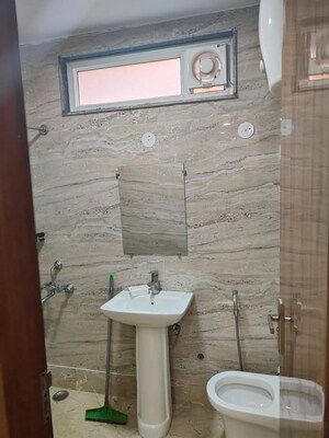 Bathroom in 2 BHK Builder Floor at Chattarpur – for Rent