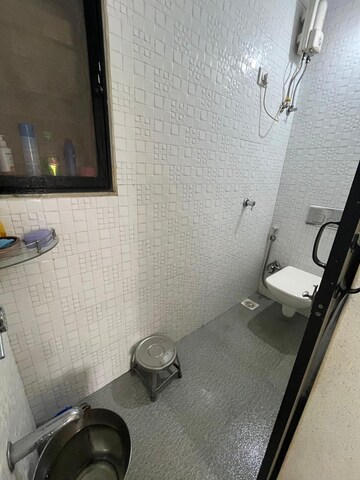 Attached Bathroom in 2 BHK Apartment at Deepti Society, Daulat Nagar – for Sale