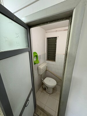 Bathroom in 1 BHK Apartment at Sankalp Siddhi Society, Malad East – for Rent