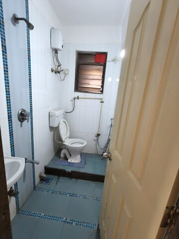 Bathroom in 2 BHK Apartment at Shree Poonam Tower, Nerul – for Rent