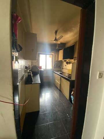 Kitchen in 3 BHK Apartment at Hiranandani Garden Brentwood, Powai – for Rent