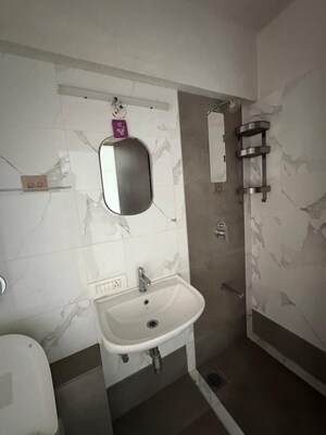 Bathroom in 1 BHK Apartment at Aayush Aarna, Chembur – for Sale